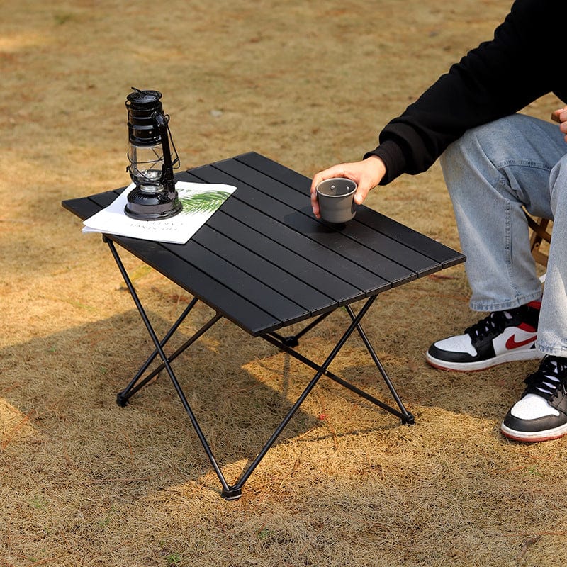 Table pliante compacte légère d'extérieur